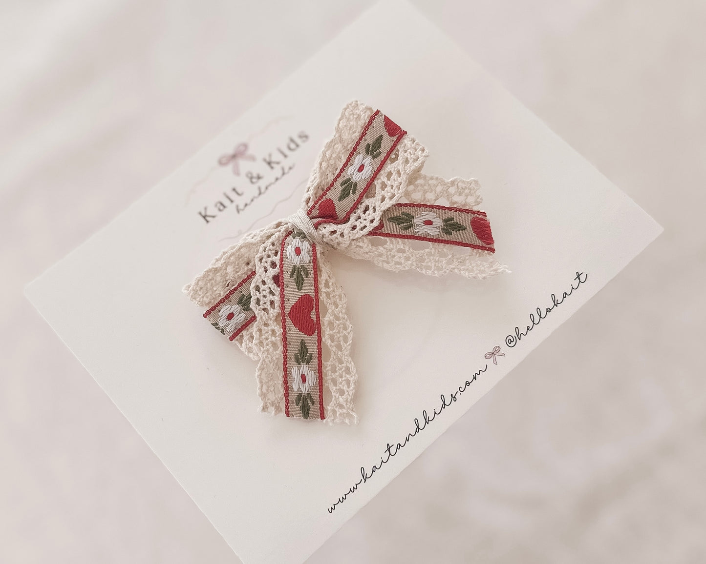 Embroidered floral and red heart