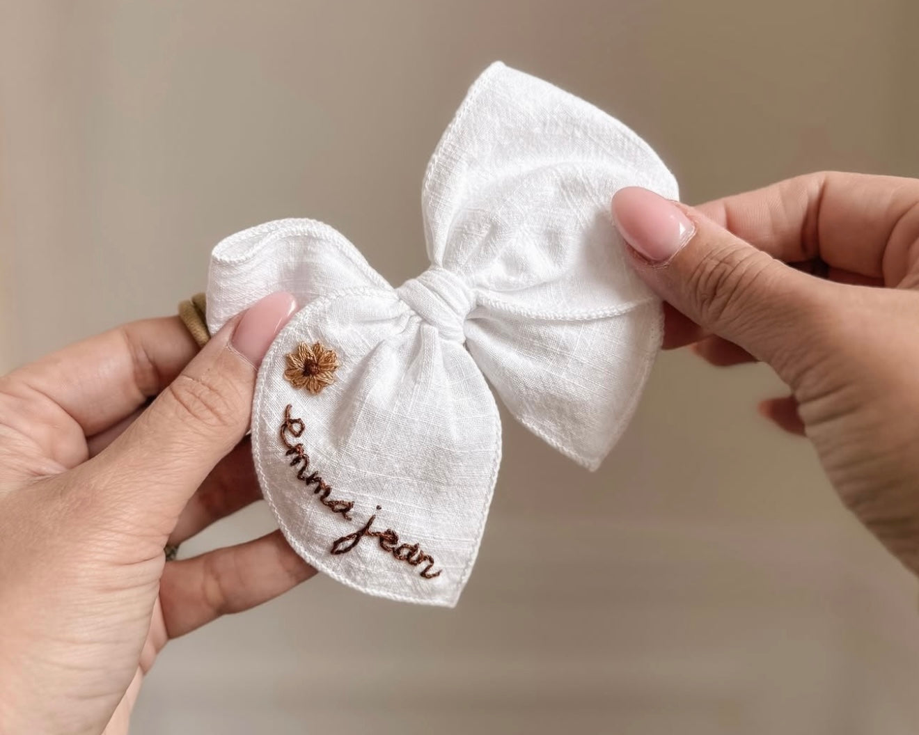 embroidered name bow