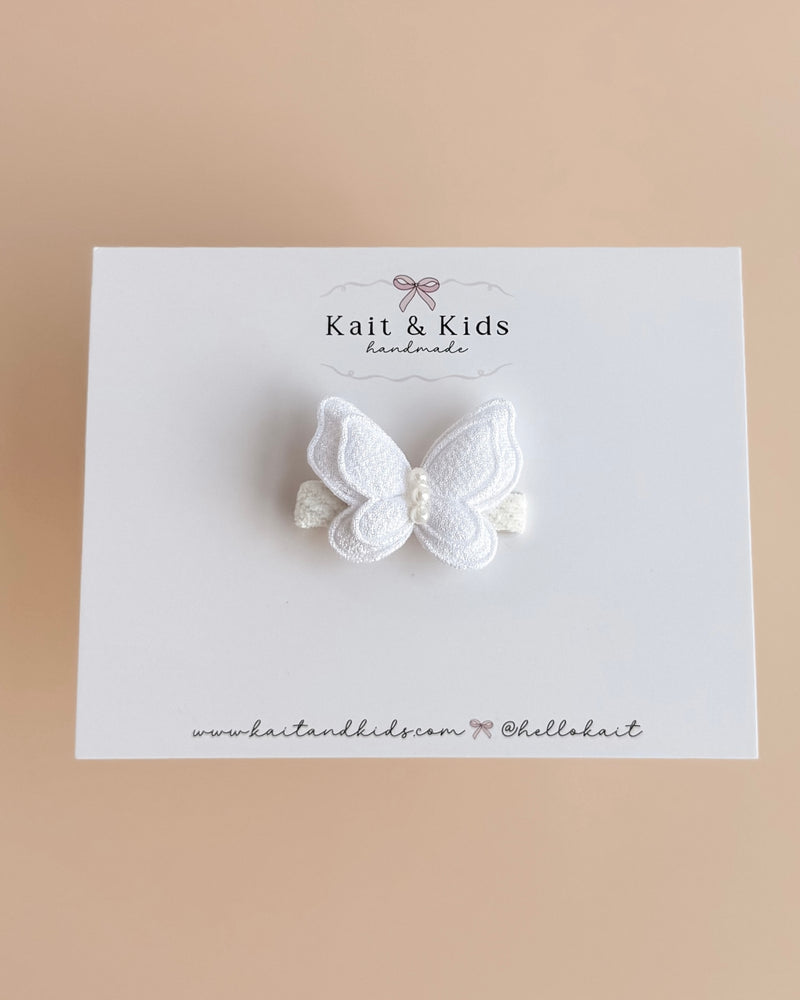 white butterfly clip